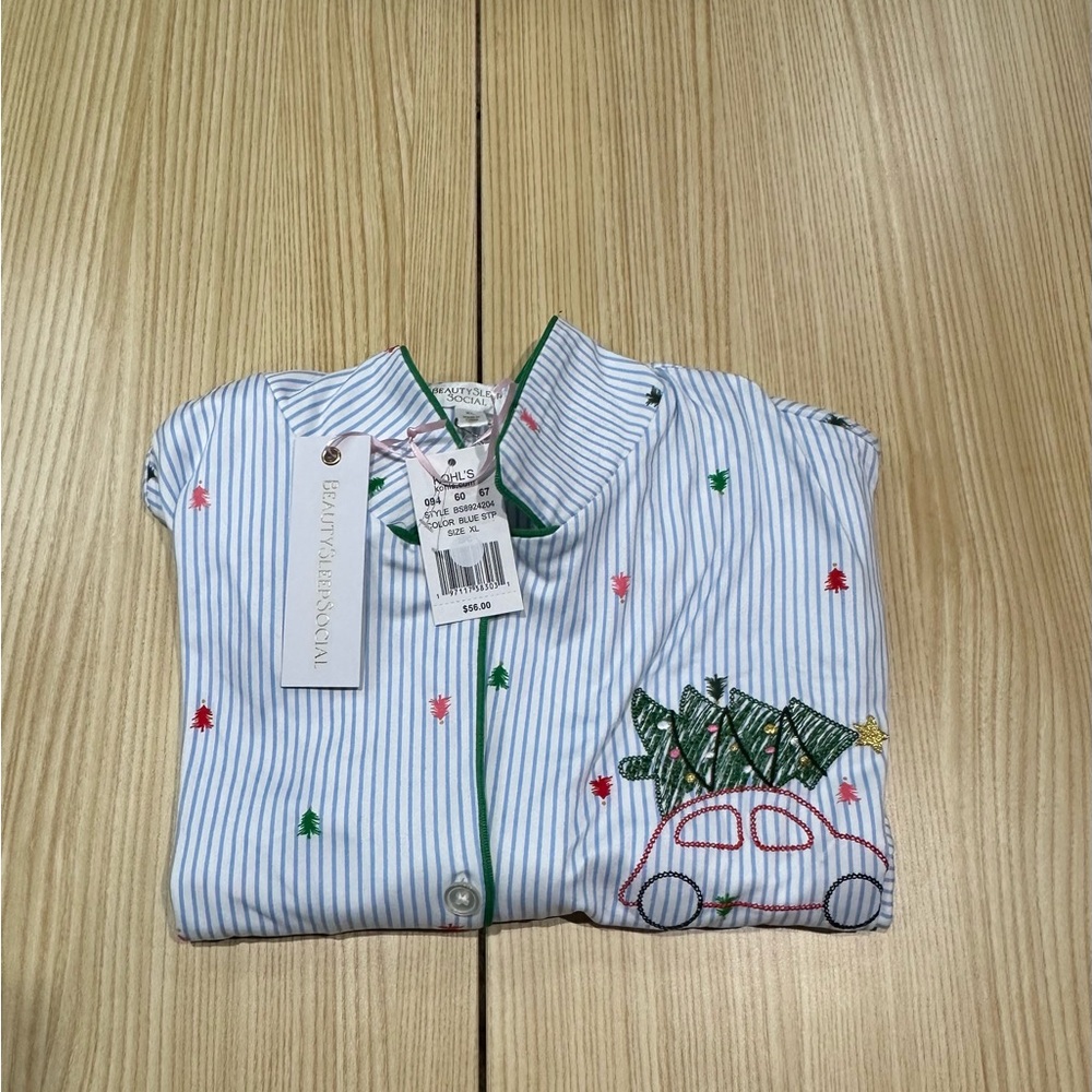 New With Tags. Beauty Sleep Social. Pajama top only. Size XL. Color: Blue Stripe
